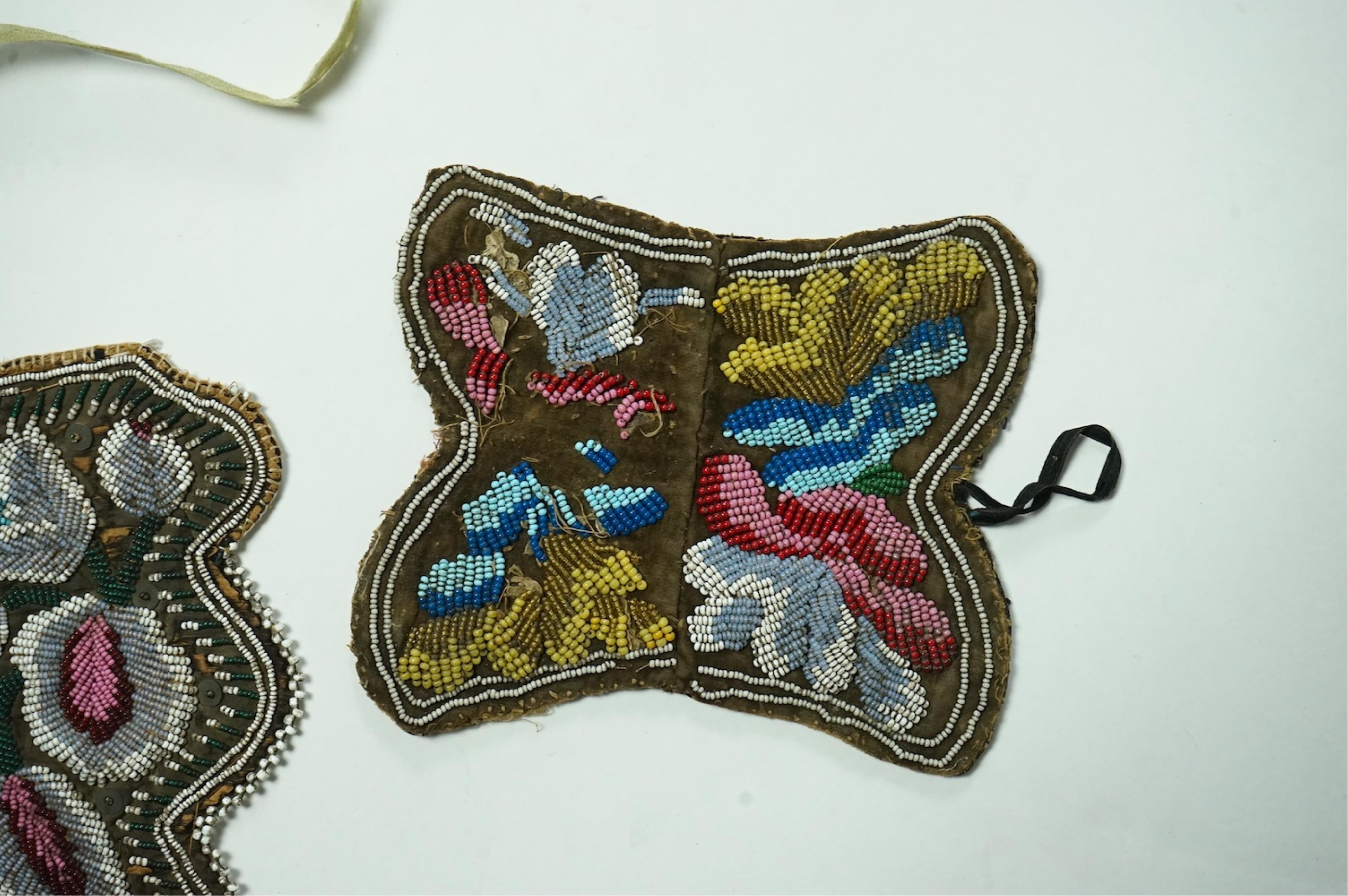Five 19th century Native American beaded bags. Including a red felt coin pouch, three varying sized bags and a beaded panel.(5) Condition - four have damage to the fringing and beading and backing cloth. The light bag th